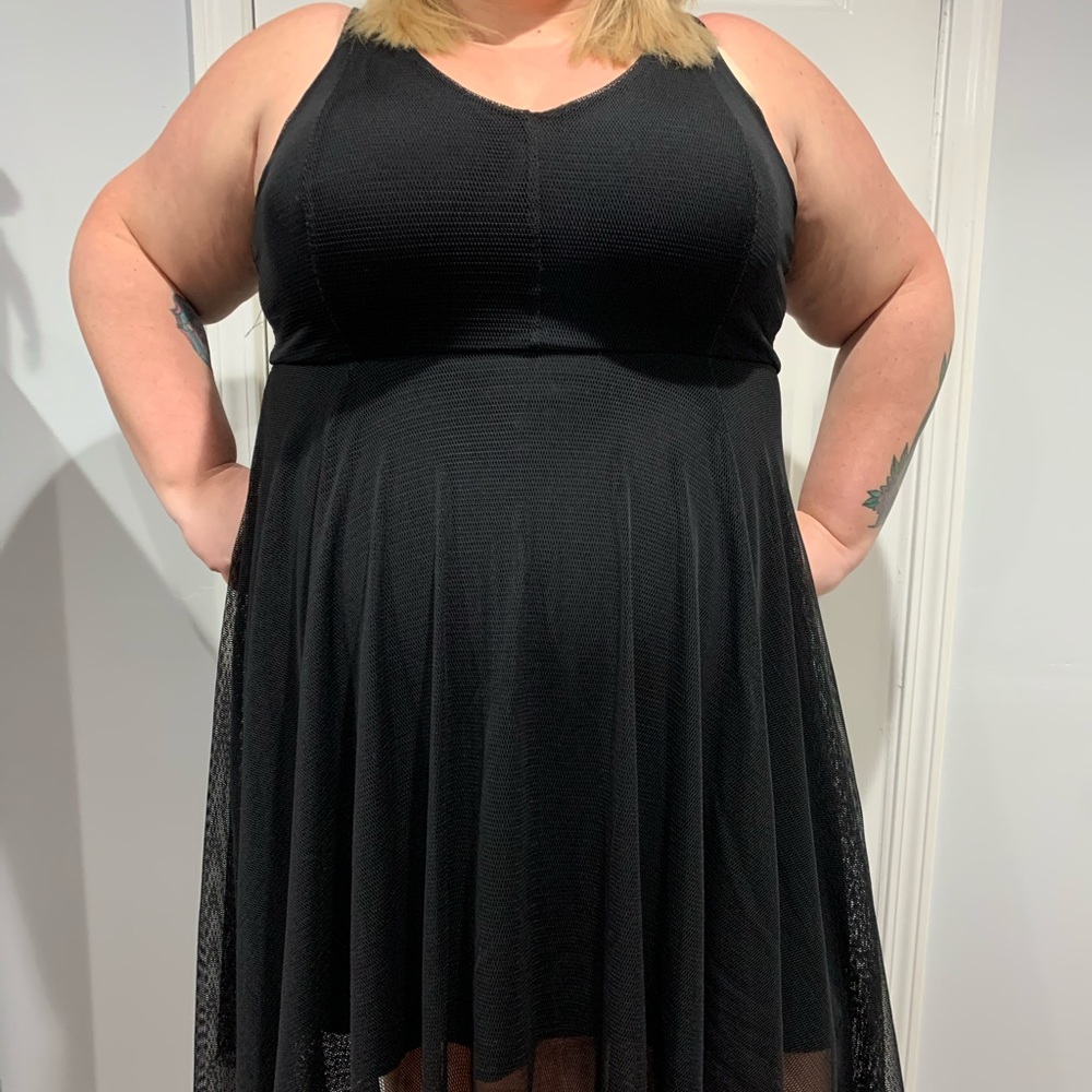Black dress with fishnet overlay